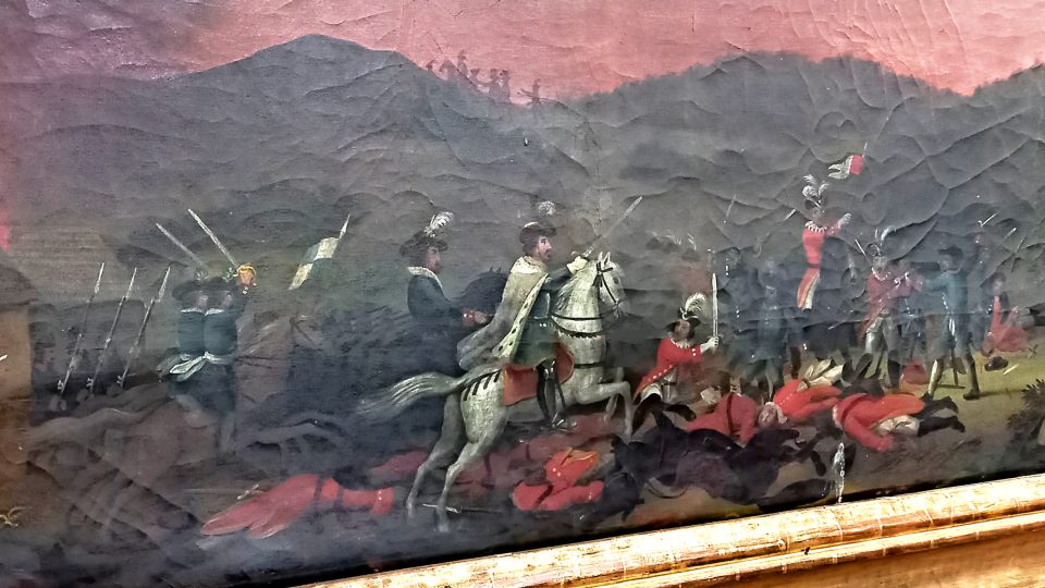 Alegorické zobrazení bitvy ve výseči obrazu v kapli